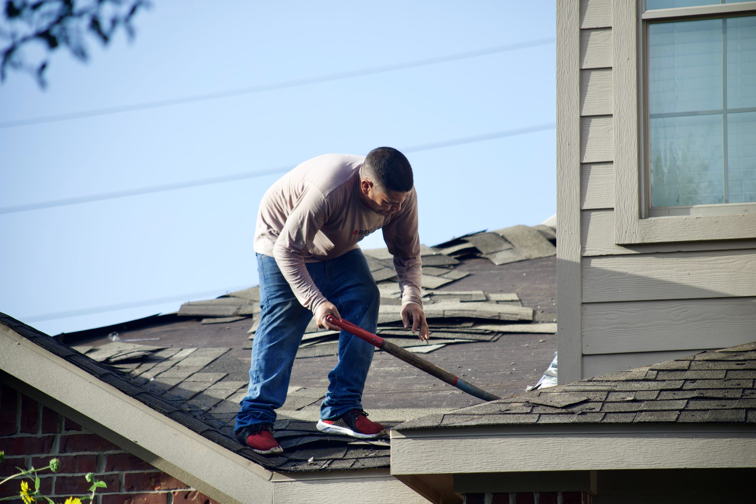 roof repair professional Thomas Roofing Solutions